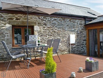 INVITING DECKING WITH RELAXING SITTING-OUT-AREA