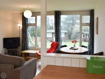 KITCHEN THROUGH TO THE LIVING AND DINING AREAS