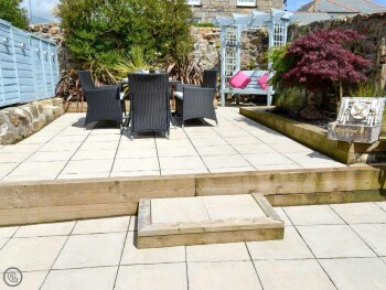 SMALL ENCLOSED GARDEN WITH PATIO AND GARDEN FURNITURE
