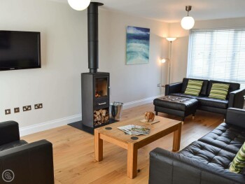 LIVING ROOM WITH WOOD BURNER