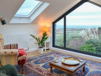 FIRST FLOOR SITTING ROOM WITH STUNNING SEA VIEWS