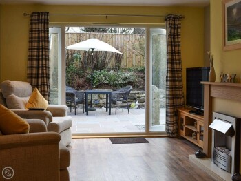 LIVING ROOM WITH PATIO DOORS