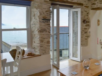 LIVING ROOM/DINING ROOM WITH SEA VIEWS