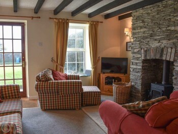 LIVING ROOM WITH WOOD BURNER