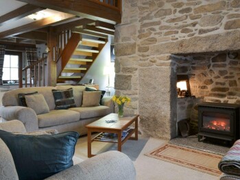 WELCOMING LIVING AREA WITH FEATURE FIREPLACE